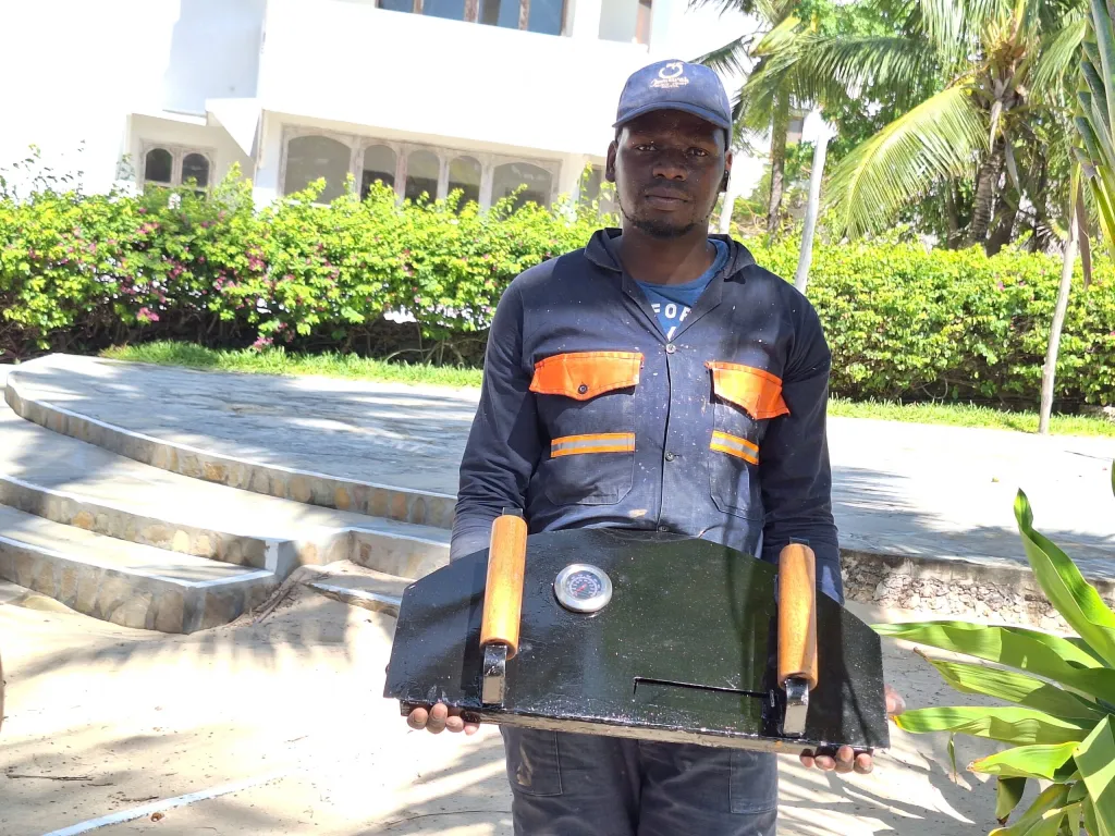 Kenbrick Ovens technician holding a finished oven door